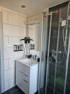 Ein Badezimmer in der Unterkunft Ferienwohnung Alpencity