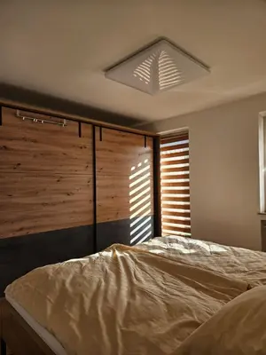 Ein Bett oder Betten in einem Zimmer der Unterkunft Ferienwohnung Alpencity