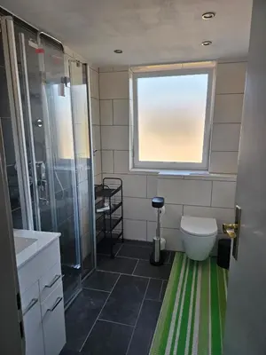 Ein Badezimmer in der Unterkunft Ferienwohnung Alpencity