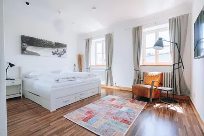 Ein Bett oder Betten in einem Zimmer der Unterkunft Große 4-Zimmer-Wohnung in der Ingolstädter City.