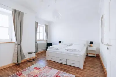 Ein Bett oder Betten in einem Zimmer der Unterkunft Große 4-Zimmer-Wohnung in der Ingolstädter City.