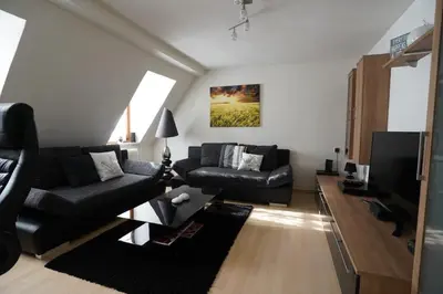 Ein Sitzbereich in der Unterkunft City- Wohnung in Top Lage