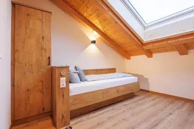 Ein Bett oder Betten in einem Zimmer der Unterkunft Taubennest