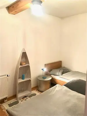 Ein Bett oder Betten in einem Zimmer der Unterkunft Ferienwohnung Schader