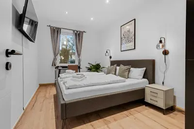 Ein Bett oder Betten in einem Zimmer der Unterkunft Frisch renovierte Wohnung - Zentral/Ruhig/Modern