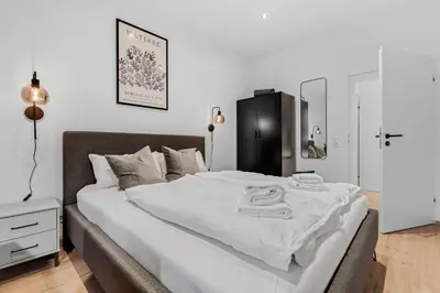 Ein Bett oder Betten in einem Zimmer der Unterkunft Frisch renovierte Wohnung - Zentral/Ruhig/Modern