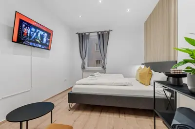 Ein Bett oder Betten in einem Zimmer der Unterkunft Frisch renovierte Wohnung - Zentral/Ruhig/Modern