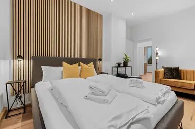 Ein Bett oder Betten in einem Zimmer der Unterkunft Frisch renovierte Wohnung - Zentral/Ruhig/Modern