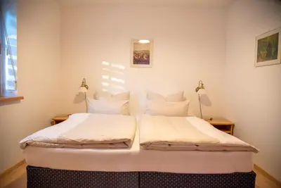 Ein Bett oder Betten in einem Zimmer der Unterkunft Ferienwohnung Filser