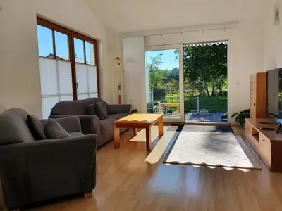 Ein Sitzbereich in der Unterkunft Ferienwohnung Filser