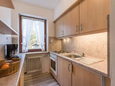 Küche/Küchenzeile in der Unterkunft Chiemgau Comfort A3 Ferienwohnanlage Oberaudorf mit Hallenbad