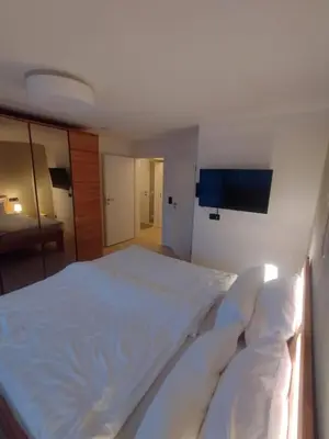 Ein Bett oder Betten in einem Zimmer der Unterkunft Ferienwohnung Bergzauber Krün