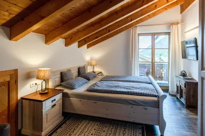 Ein Bett oder Betten in einem Zimmer der Unterkunft Ferienwohnungen LARA Wohnung 3