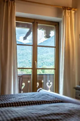 Ein Bett oder Betten in einem Zimmer der Unterkunft Ferienwohnungen LARA Wohnung 3