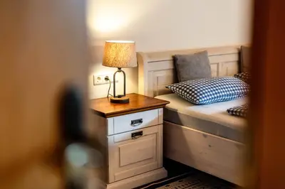 Ein Bett oder Betten in einem Zimmer der Unterkunft Ferienwohnungen LARA Wohnung 3