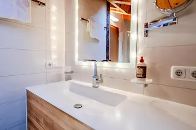 Ein Badezimmer in der Unterkunft Ferienwohnungen LARA Wohnung 3