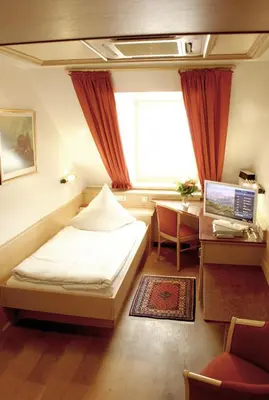 Ein Bett oder Betten in einem Zimmer der Unterkunft AppartementPension Zum Zacherl