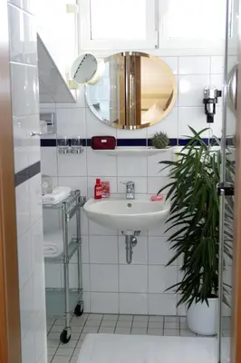 Ein Badezimmer in der Unterkunft AppartementPension Zum Zacherl