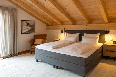 Ein Bett oder Betten in einem Zimmer der Unterkunft Aurum Lodge
