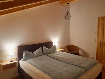 Ein Bett oder Betten in einem Zimmer der Unterkunft Ferienwohnungen Rohnbogner