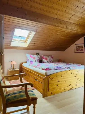 Ein Bett oder Betten in einem Zimmer der Unterkunft Hexen Haus
