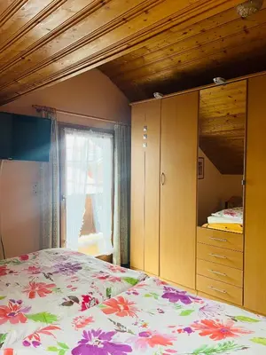 Ein Bett oder Betten in einem Zimmer der Unterkunft Hexen Haus
