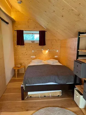 Ein Bett oder Betten in einem Zimmer der Unterkunft Cozystadl