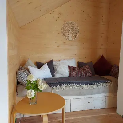 Ein Sitzbereich in der Unterkunft Cozystadl