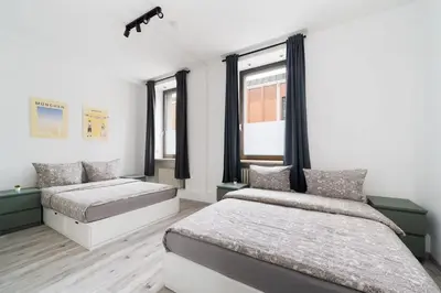 Ein Bett oder Betten in einem Zimmer der Unterkunft 90m2 in Münchener Innenstadt