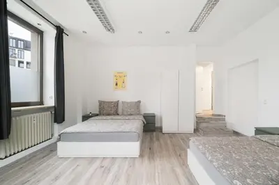 Ein Bett oder Betten in einem Zimmer der Unterkunft 90m2 in Münchener Innenstadt
