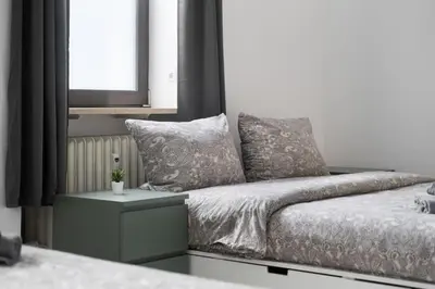 Ein Bett oder Betten in einem Zimmer der Unterkunft 90m2 in Münchener Innenstadt