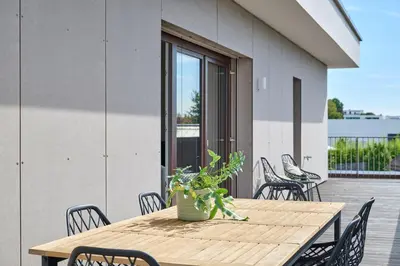 Ein Balkon oder eine Terrasse in der Unterkunft PL-Apartments-Freising - The Penthouse - UrbanElegance