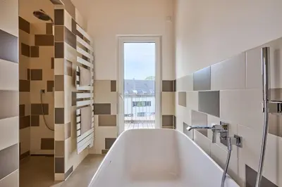 Ein Badezimmer in der Unterkunft PL-Apartments-Freising - The Penthouse - UrbanElegance