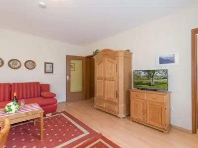 Ein Sitzbereich in der Unterkunft Chiemgau Comfort A2 Ferienwohnanlage Oberaudorf mit Hallenbad und Sauna