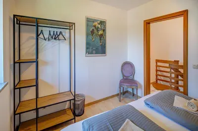 Ein Bett oder Betten in einem Zimmer der Unterkunft Moderne Maisonette mit Garten