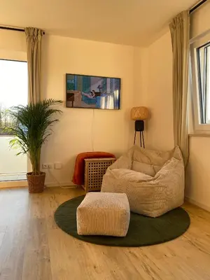 Ein Sitzbereich in der Unterkunft Design-Apartment in Langenbach bei München, nahe Flughafen München