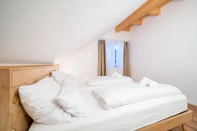 Ein Bett oder Betten in einem Zimmer der Unterkunft LIBORIA I Traumhafte Ferienwohnung in Aidling am Riegsee