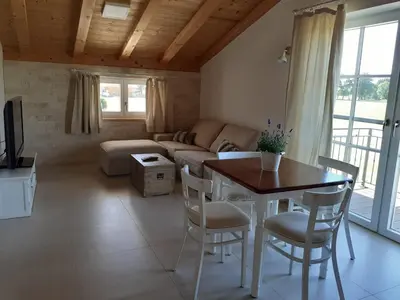 Ein Sitzbereich in der Unterkunft Ferienwohnung - Übersee am Chiemsee