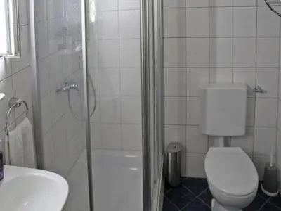 Ein Badezimmer in der Unterkunft Ferienhaus Nr 21, Kategorie Komfort, Feriendorf Hochbergle, Allgäu