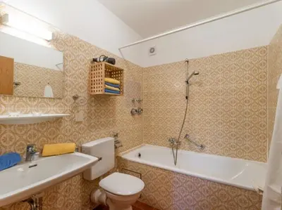 Ein Badezimmer in der Unterkunft Chiemgau Comfort E2 Ferienwohnanlage Oberaudorf mit Hallenbad und Sauna