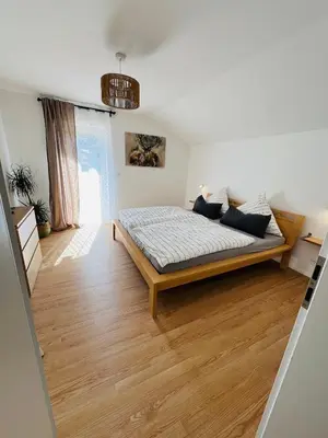 Ein Bett oder Betten in einem Zimmer der Unterkunft Ferienwohnung Leonie