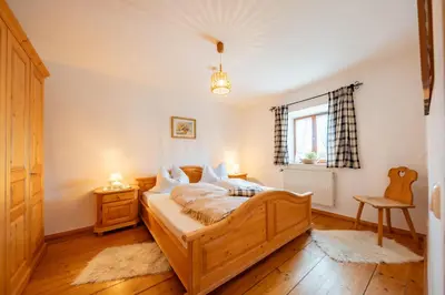 Ein Bett oder Betten in einem Zimmer der Unterkunft Weissnhof