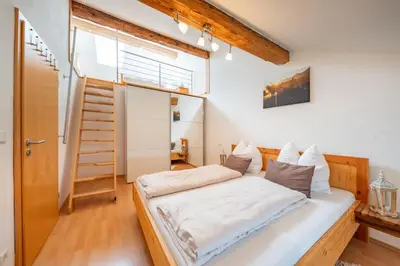 Ein Bett oder Betten in einem Zimmer der Unterkunft Weissnhof