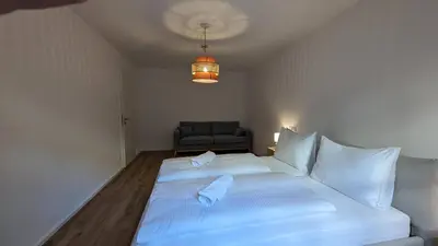 Ein Bett oder Betten in einem Zimmer der Unterkunft LIBORIA I Traumhafte Ferienwohnung in Aidling am Riegsee
