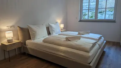 Ein Bett oder Betten in einem Zimmer der Unterkunft LIBORIA I Traumhafte Ferienwohnung in Aidling am Riegsee