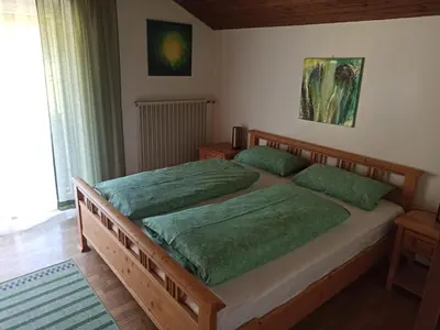 Ein Bett oder Betten in einem Zimmer der Unterkunft Fewo am Glückswegerl