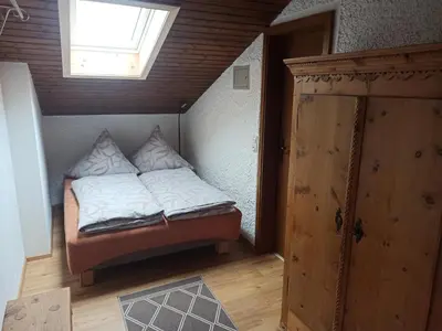 Ein Bett oder Betten in einem Zimmer der Unterkunft Fewo am Glückswegerl