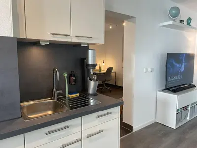 Küche/Küchenzeile in der Unterkunft Grand Suite - Perfekt für 6! BBQ WLAN Parken Messe