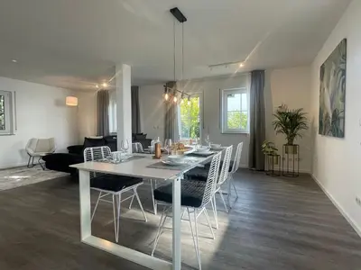 Ein Sitzbereich in der Unterkunft Grand Suite - Perfekt für 6! BBQ WLAN Parken Messe