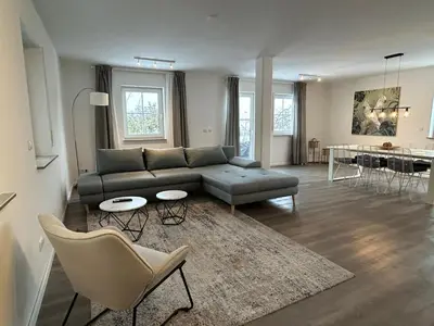 Ein Sitzbereich in der Unterkunft Grand Suite - Perfekt für 6! BBQ WLAN Parken Messe